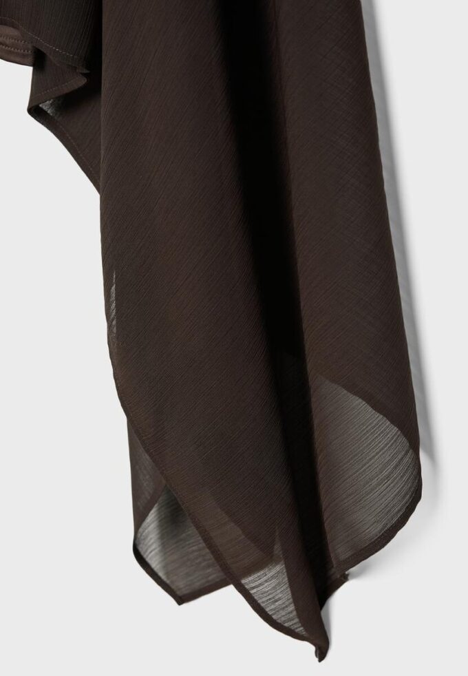 Asymmetrisk cape