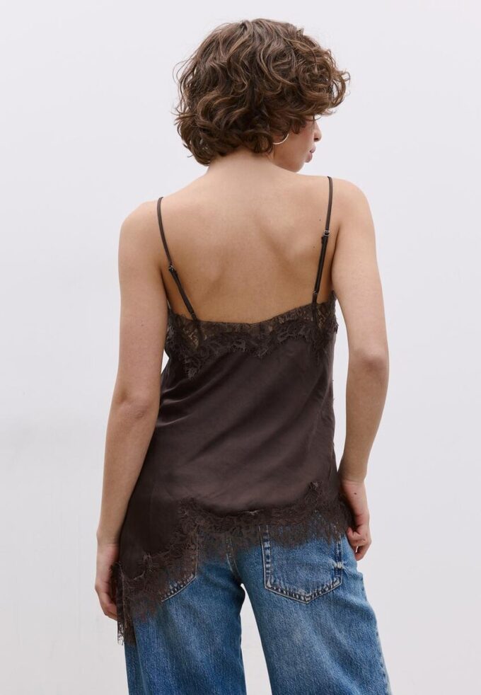 Asymmetrisk spets-linne-toppar Asymmetrisk spets-linne-toppar