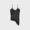 Asymmetrisk spets-linne-toppar