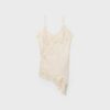 Asymmetrisk spets-linne-toppar