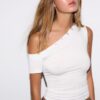 Asymmetrisk T-shirt med knappar Asymmetrisk T-shirt med knappar