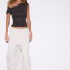 Asymmetrisk T-shirt med knappar Asymmetrisk T-shirt med knappar