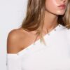 Asymmetrisk T-shirt med knappar Asymmetrisk T-shirt med knappar