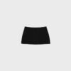 Basplagg med enkel stickad skort