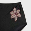 Bikinitrosor med broderade blommor