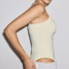 Body med detaljer i blond spets Body med detaljer i blond spets