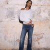 Broderade bell bottom-jeans med fickor