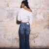 Broderade bell bottom-jeans med fickor