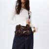 Crossbody-väska i konstläder
