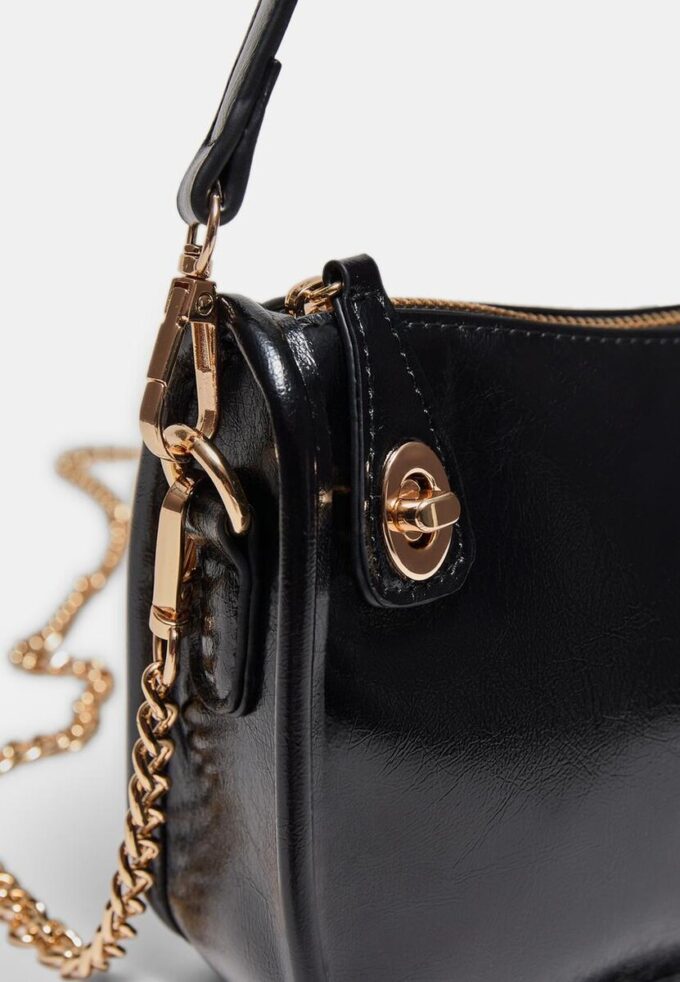 Crossbody-väska med flera bäralternativ