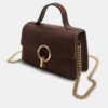 Crossbody-väska med rund spänne