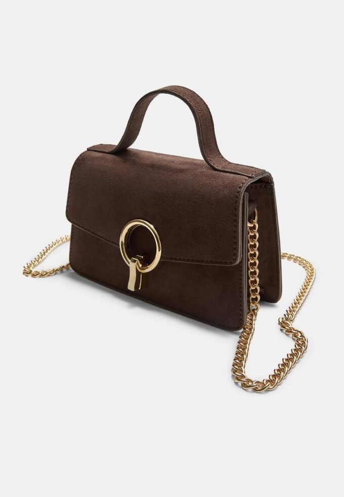 Crossbody-väska med rund spänne