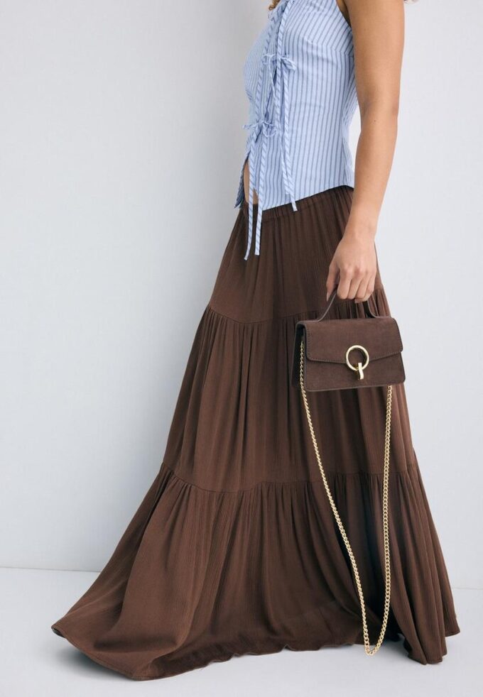 Crossbody-väska med rund spänne