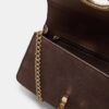 Crossbody-väska med rund spänne