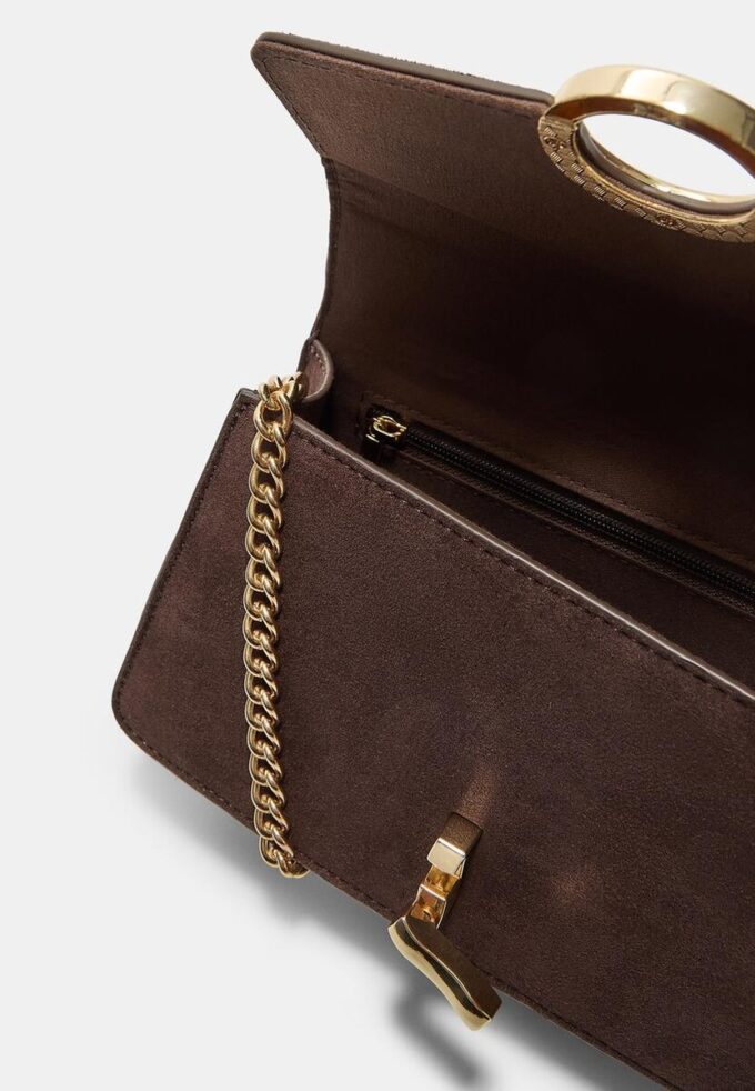 Crossbody-väska med rund spänne
