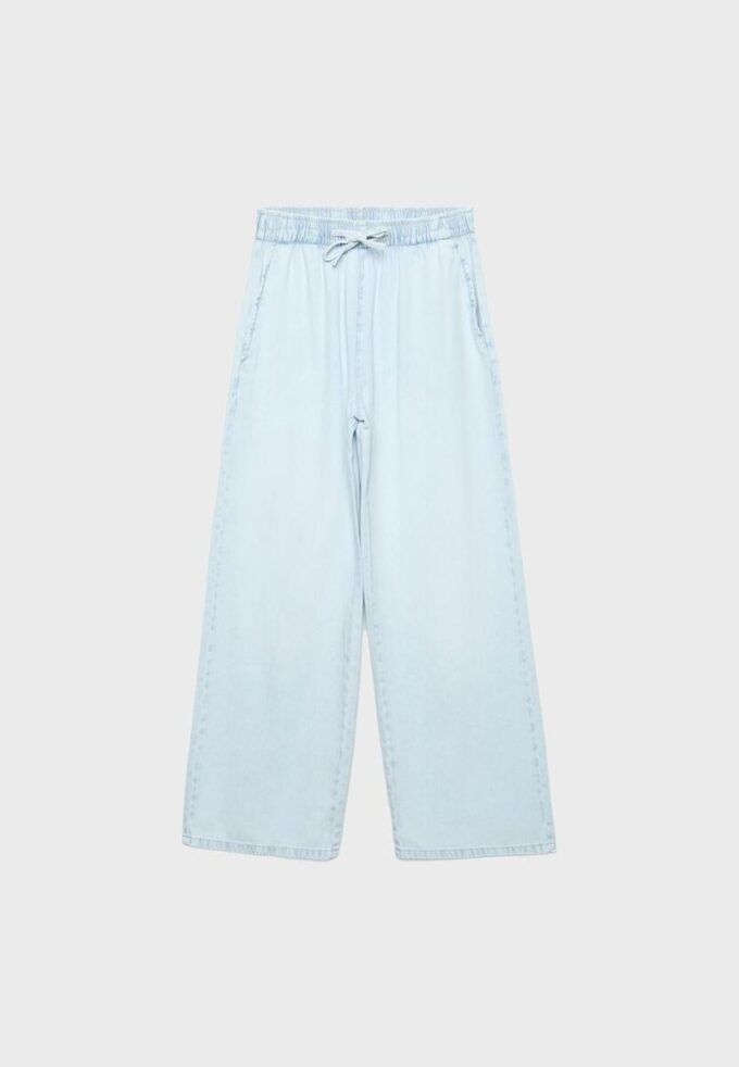 Flödande jeansbyxor med dragsko Flödande jeansbyxor med dragsko