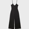 Flödande jumpsuit med spaghettiband