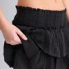 Flödande skort med volanger Flödande skort med volanger