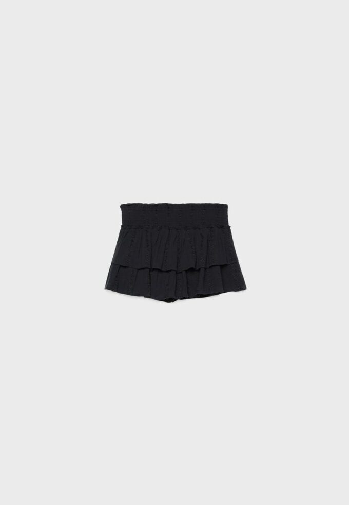 Flödande skort med volanger Flödande skort med volanger