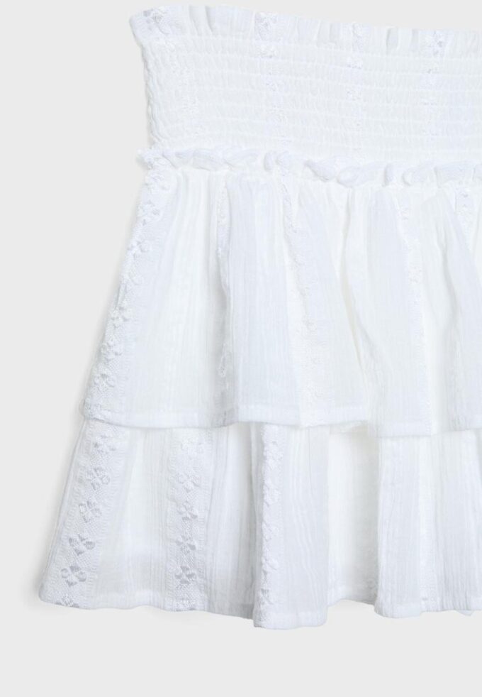 Flödande skort med volanger