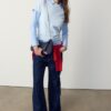 Halvmåneformad axelväska i denim