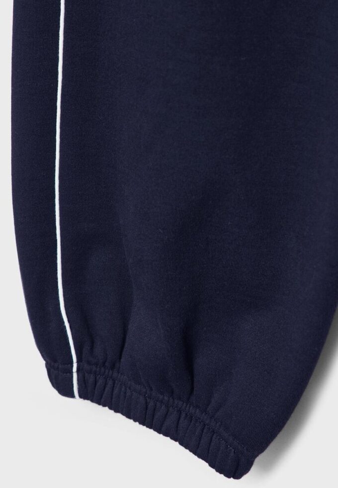 Joggingbyxor med piping