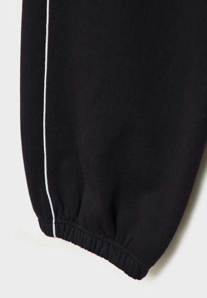 Joggingbyxor med piping