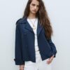 Kort, flödande trenchcoat med bälte Kort, flödande trenchcoat med bälte