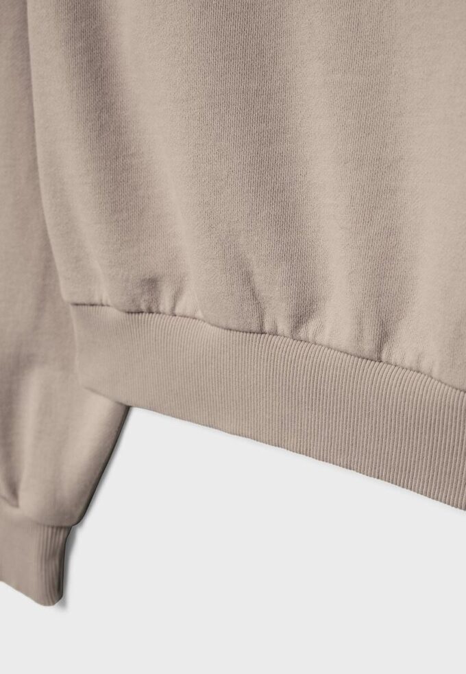 Kort sweatshirt med tvättad effekt Kort sweatshirt med tvättad effekt
