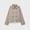 Kort trenchcoat med puffärmar och avtagbar huva