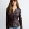 Kraglös kavaj med peplum i skinnlook