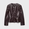 Kraglös kavaj med peplum i skinnlook