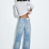 Lågmidjade jeans med Wide Leg och stjärndetalj Lågmidjade jeans med Wide Leg och stjärndetalj