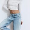 Lågmidjade jeans med Wide Leg och stjärndetalj Lågmidjade jeans med Wide Leg och stjärndetalj