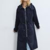 Lång, flödande parkas Lång, flödande parkas