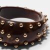 Maxi-armband med fasta nitar