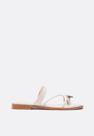 Platta sandaler med stendetaljer