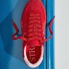 Platta sneakers med skinndetaljer