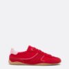 Platta sneakers med skinndetaljer