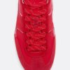 Platta sneakers med skinndetaljer