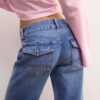 Raka jeans med dubbla metallknappar Raka jeans med dubbla metallknappar