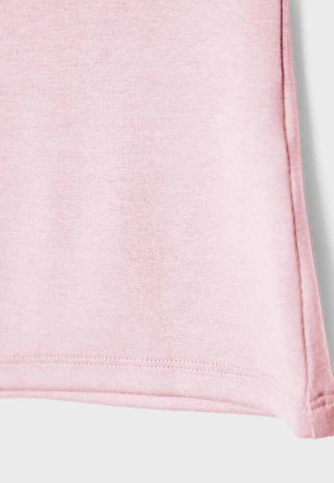Ärmlös T-shirt med trattkrage