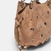 Rund crossbody-väska med ögondetaljer