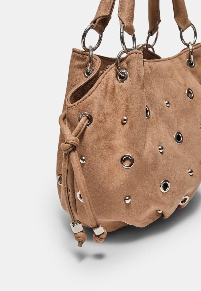 Rund crossbody-väska med ögondetaljer