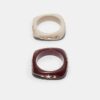 Set med 2 armband med stjärnor och briljantslipade stenar