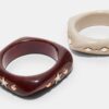 Set med 2 armband med stjärnor och briljantslipade stenar