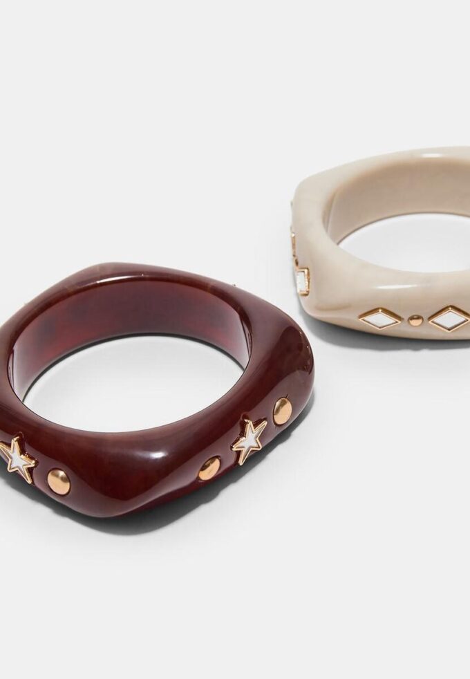 Set med 2 armband med stjärnor och briljantslipade stenar