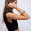 Set med 3 styva armband med nitar