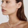 Set med 4 måne- och solhalsband