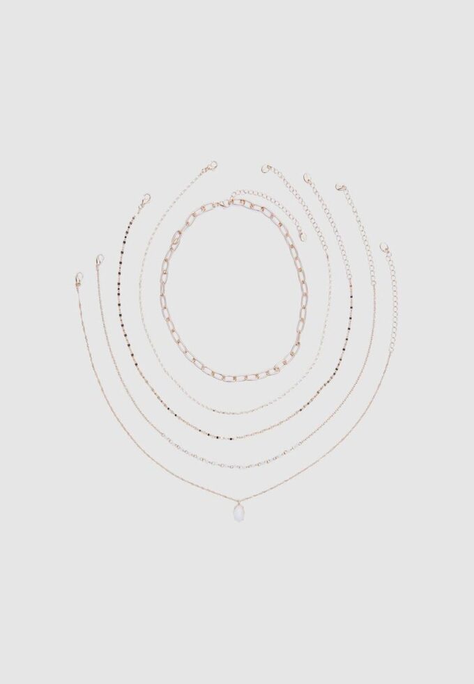 Set med 5 halsband med rosa stenar